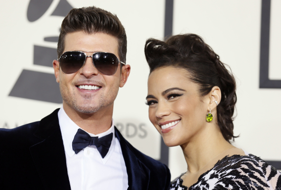 Robin Thicke and Paula Patton arrive at the 56th annual Grammy Awards in Los Angeles