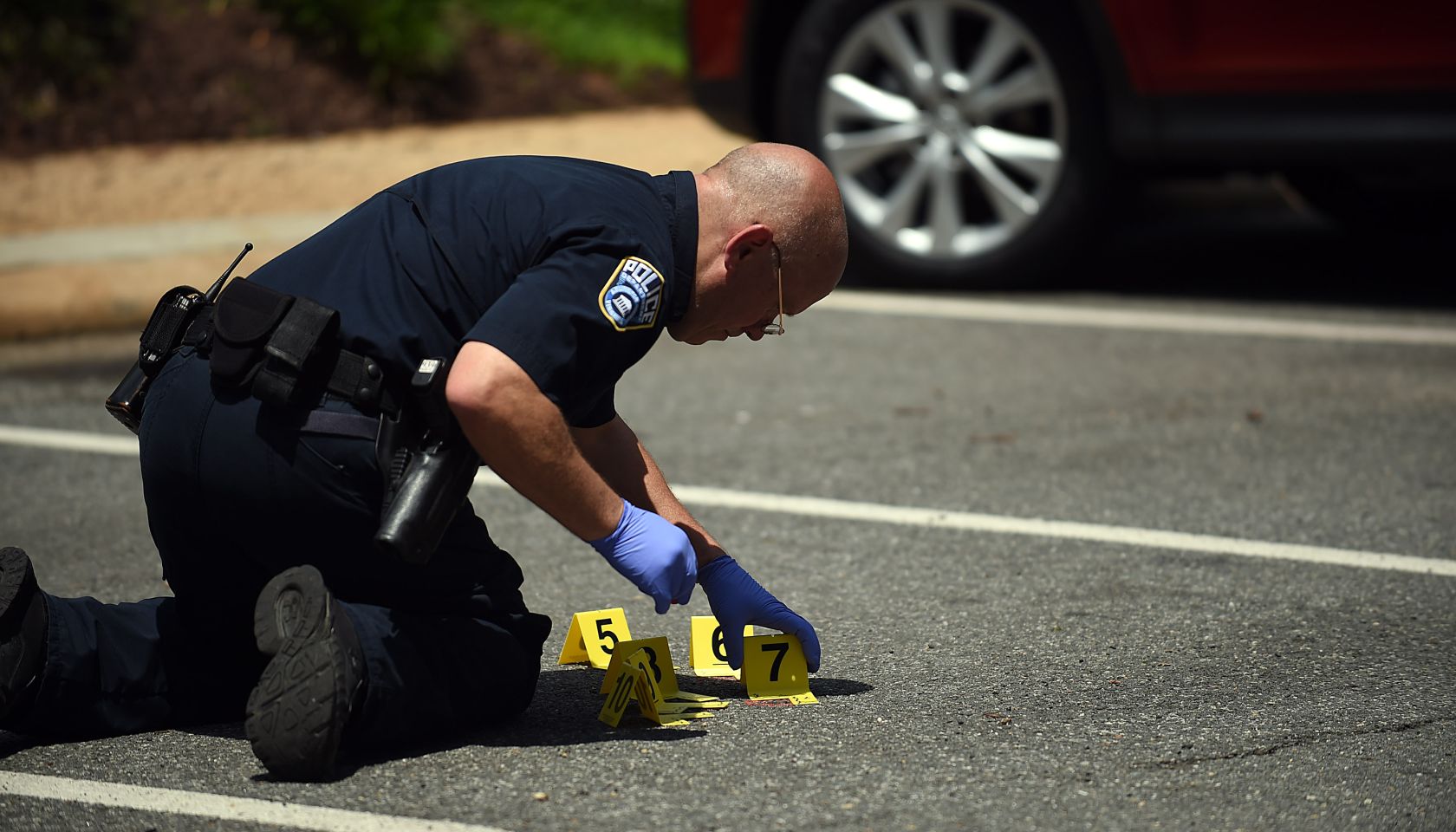 ARLINGTON, VA - May 18: Crime scene marker are placed near an a