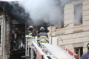 Fire fighters on the scene at a building explosion in Borough Park, Brooklyn on October 3rd, 2015