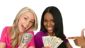 two women with money