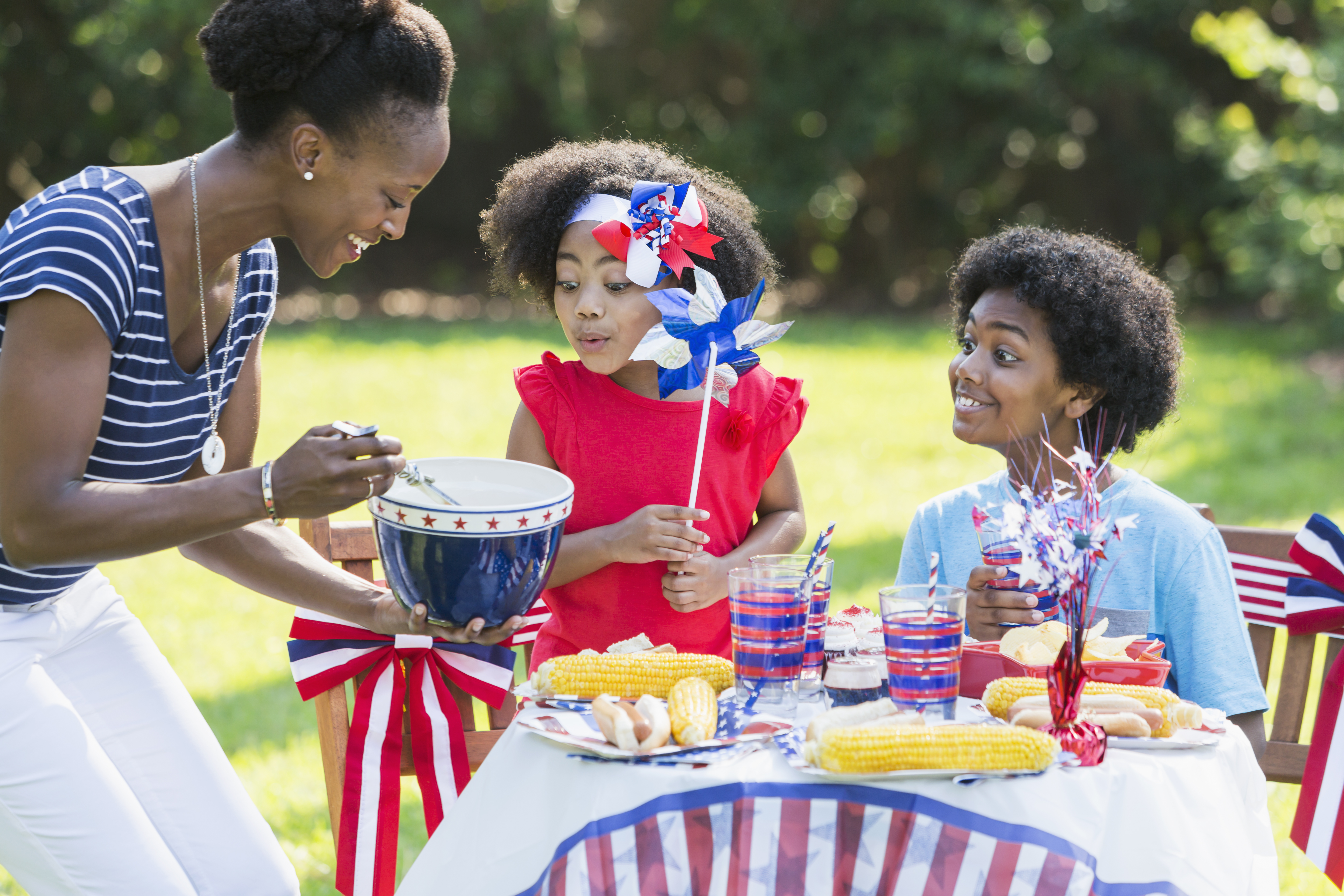 Mother and children celebrating 4th of July