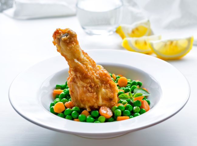 Healthy eating, chicken drumstick and vegetables
