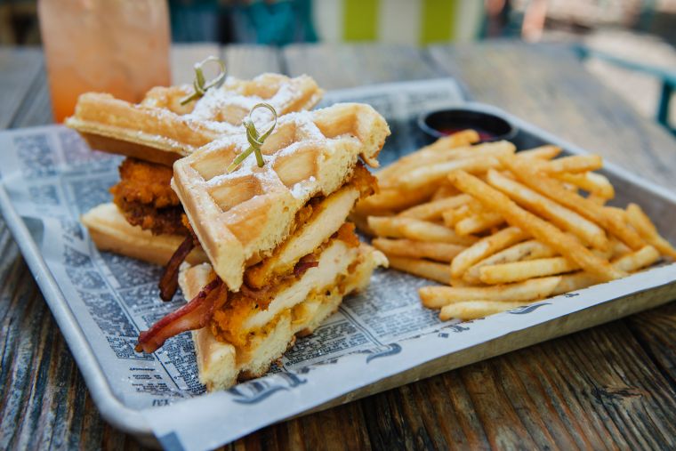 Enjoy a fried chicken, waffle sandwich!