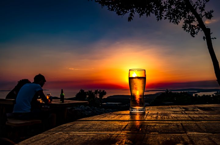 Scenic sunset with beer