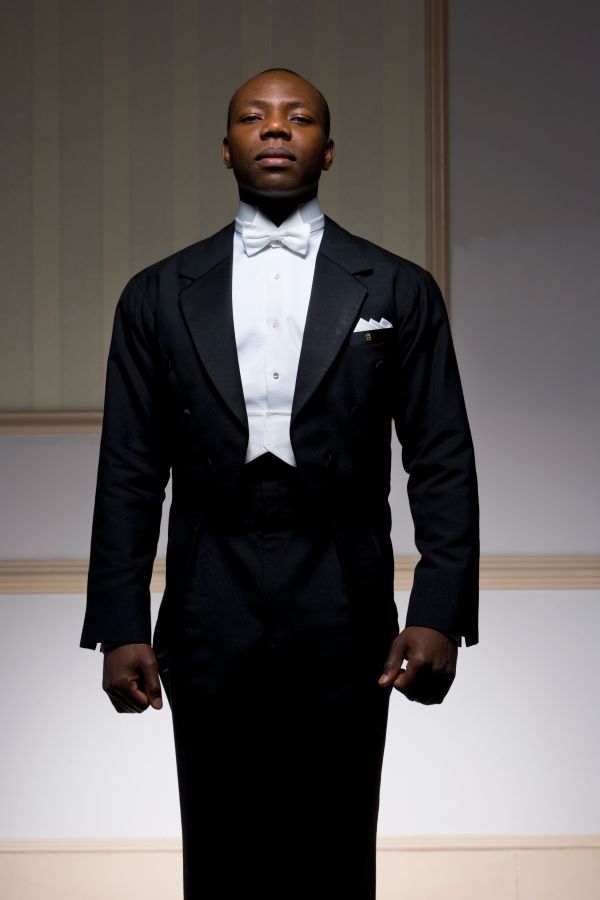 Male ballroom dancer standing, portrait