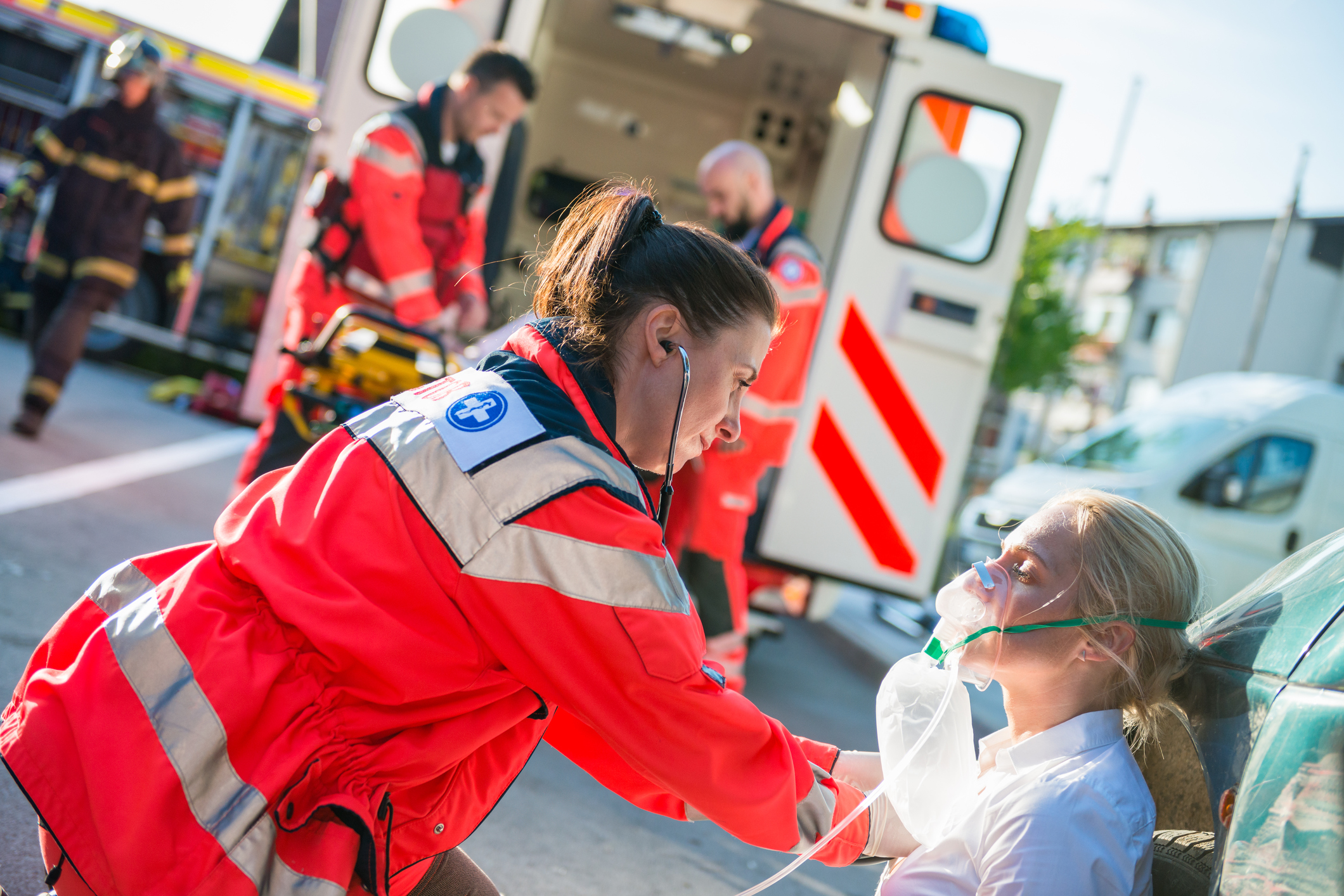 Female Paramedic Helping Injured Women