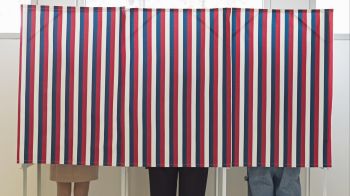 Voters in voting booths