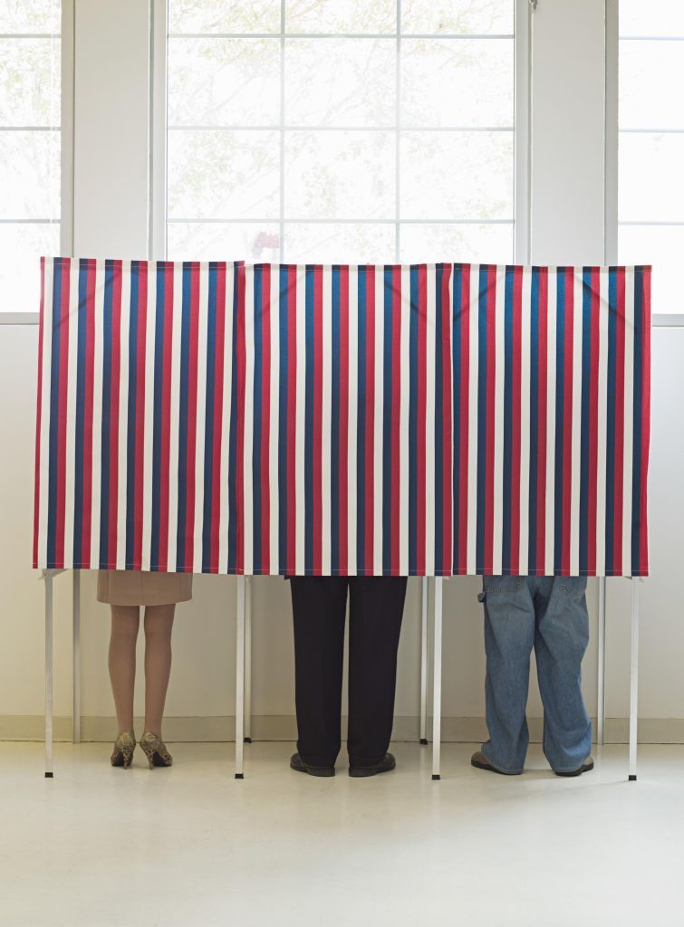 Voters in voting booths