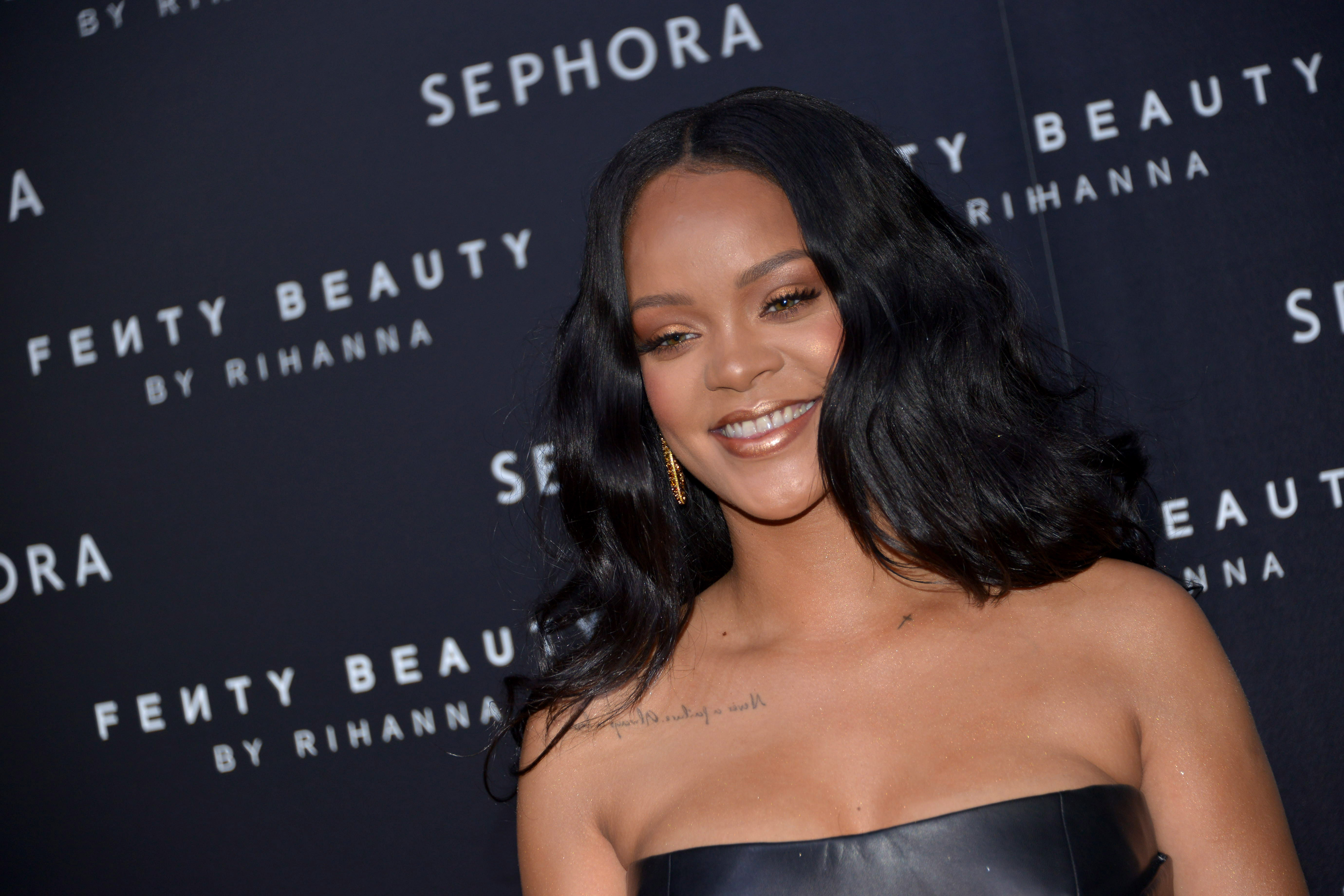 Rihanna attends the launch of her makeup line Fenty Beauty