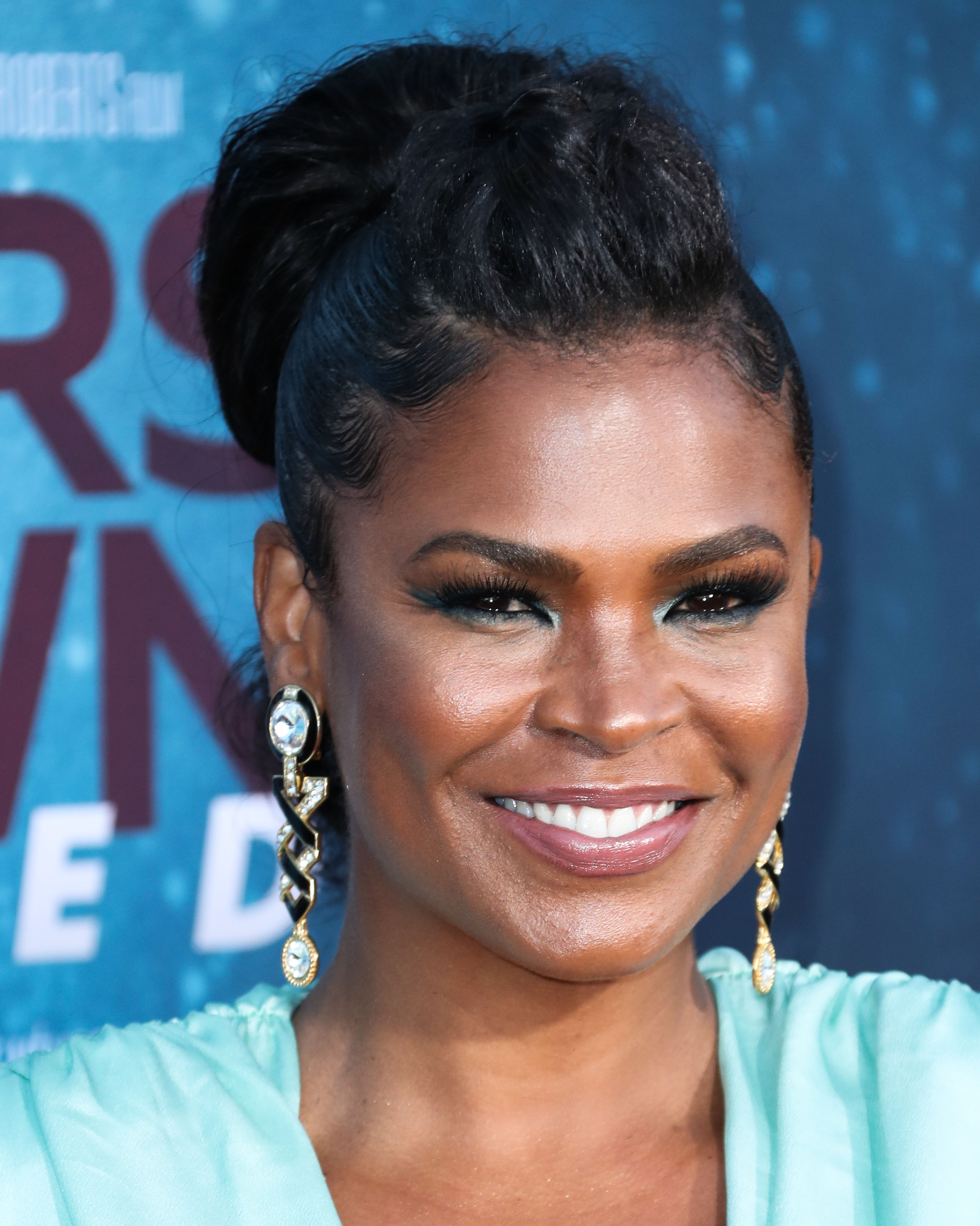 Actress Nia Long arrives at the Los Angeles Premiere Of Entertainment Studios' '47 Meters Down Uncaged' held at the Regency Village Theatre on August 13, 2019 in Westwood, Los Angeles, California, United States.