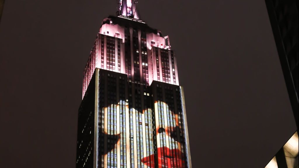 Harpers Bazaar celebrates its 150th anniversary with a light show of archival images projected on the Empire State Building