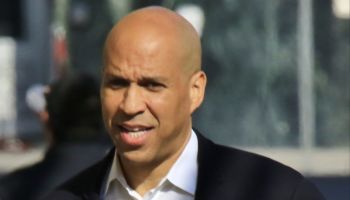 Senator Cory Booker is confronted by a metal detector as he arrives for an appearance on Jimmel Kimmel Live!