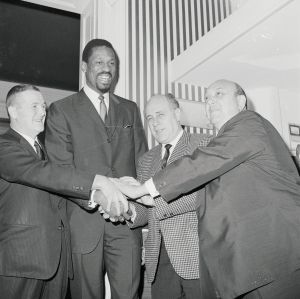 Bill Russell Joining Hands with Officials
