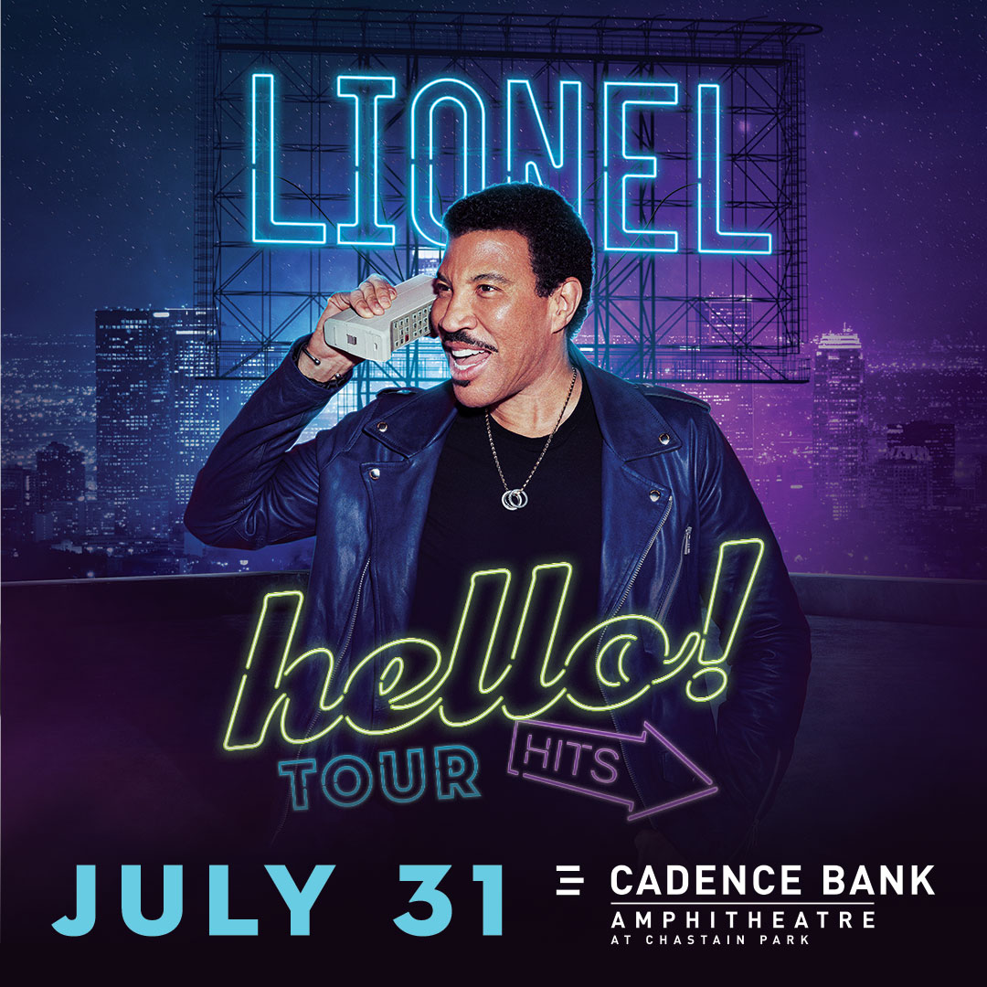 Lionel Richie standing in front of a neon "Lionel" sign, wearing a black leather jacket and holding a microphone, with a cityscape in the background and text promoting his "Hello Tour Hits" concert on July 31.