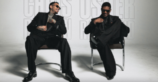Two men in black suits sitting in chairs, with text "CHRIS USHER" and "THE R&B TOUR" displayed.